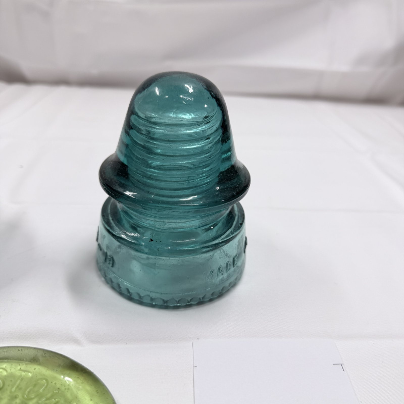Lot 142: Antique Glass Telegraph/Telephone Insulators - Hemingray, Clear & Teal, 4pc + Token