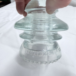 Lot 142: Antique Glass Telegraph/Telephone Insulators - Hemingray, Clear & Teal, 4pc + Token