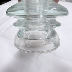 Lot 142: Antique Glass Telegraph/Telephone Insulators - Hemingray, Clear & Teal, 4pc + Token