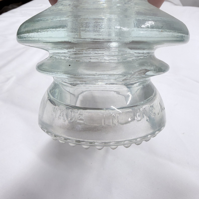 Lot 142: Antique Glass Telegraph/Telephone Insulators - Hemingray, Clear & Teal, 4pc + Token