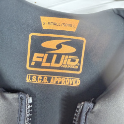 Lot 178: Life Jackets: Stearns Adult S/M Gray, Fluid Aquatics X-Small/Small U.S.C.G. Approved