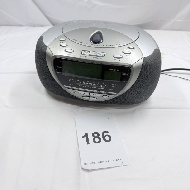 Lot 186: Durabrand Silver CD Player Dual Alarm Clock Radio AM/FM Digital Compact Disc