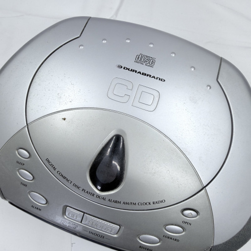 Lot 186: Durabrand Silver CD Player Dual Alarm Clock Radio AM/FM Digital Compact Disc
