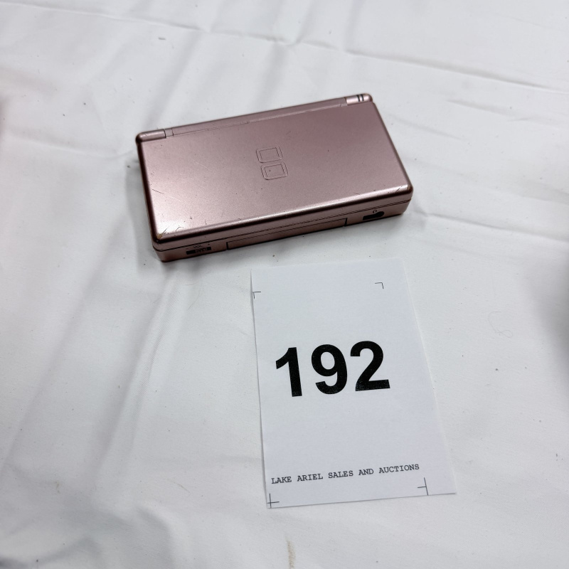 Lot 192: Nintendo DS Lite Handheld Gaming Console - Metallic Rose/Pink
