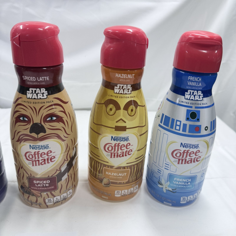 Lot 194: Nestle Coffee-mate Star Wars Limited Edition Creamer 5-Pack Chewbacca C-3PO R2-D2 Darth Vader Boba Fett