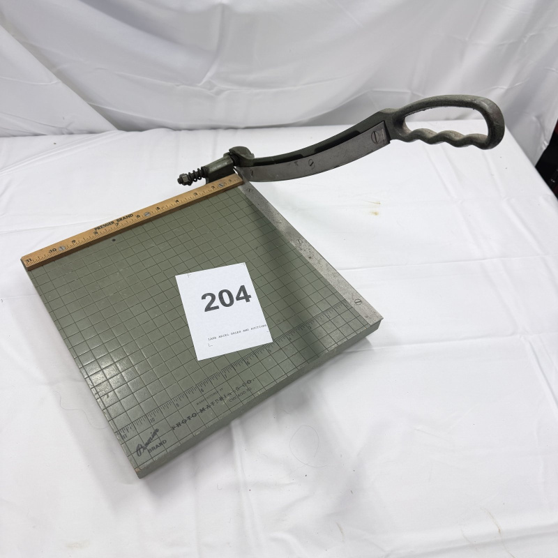 Lot 204: Vintage Metal Paper Cutter Trimmer with Grid Base and Wooden Ruler Edge