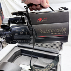 Lot 205: Panasonic OmniMovie VHS HQ AF X8 CCD Camcorder with Case