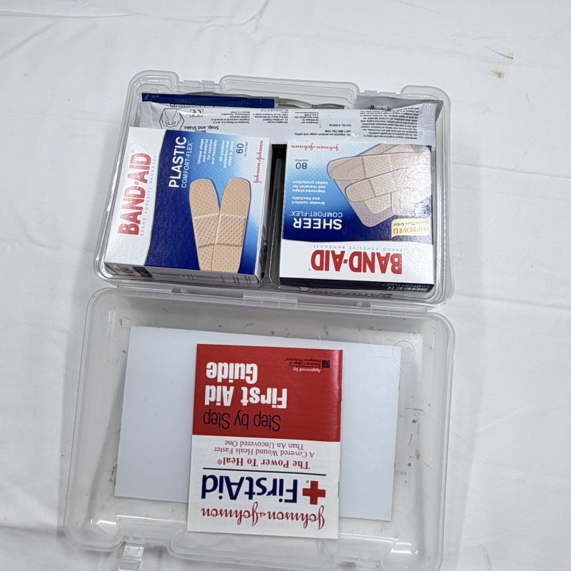 Lot 211: Johnson & Johnson 170 Item All-Purpose First Aid Kit in Clear Plastic Case