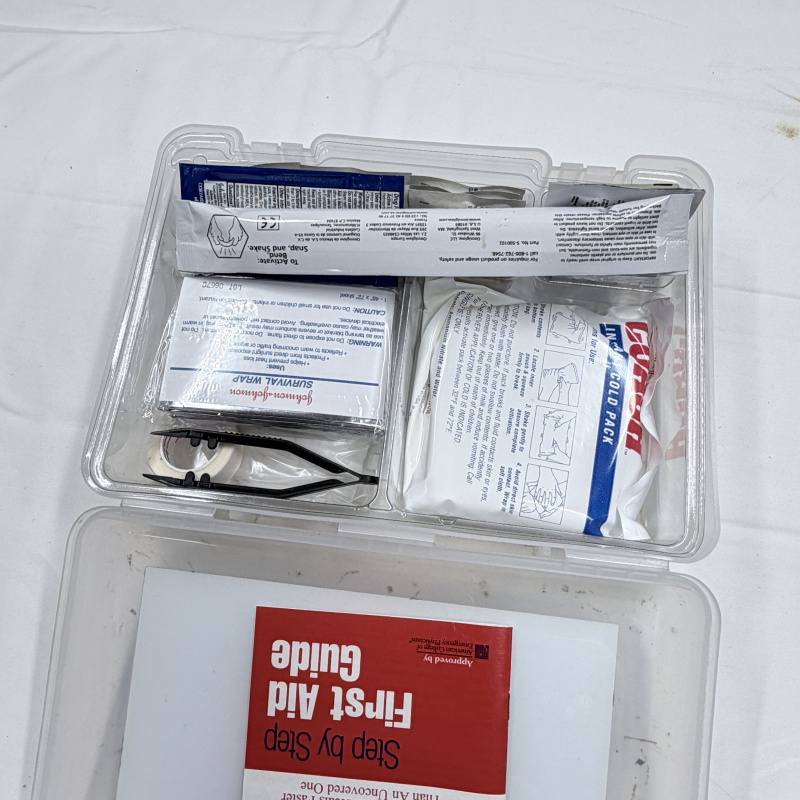 Lot 211: Johnson & Johnson 170 Item All-Purpose First Aid Kit in Clear Plastic Case