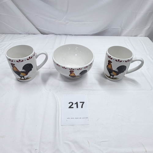 Lot 217: Rooster Pattern Ceramic Coffee Mugs and Bowl Set of 3 White with Red Trim