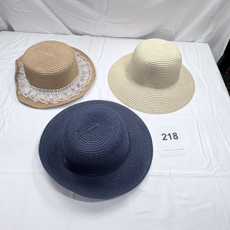 Lot 218: Three Straw Sun Hats - Navy, Beige with Lace Trim, and Tan