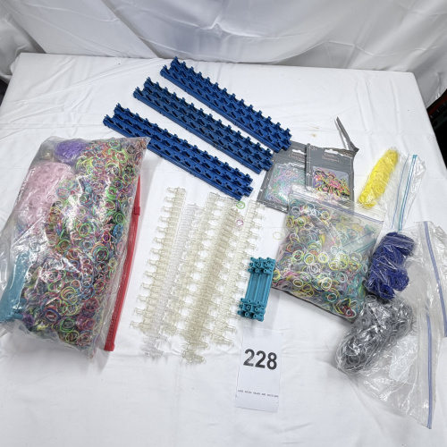 Lot 228: Rainbow Loom Rubber Bands & Clear Plastic C-Clips with Blue Storage Racks