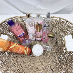 Lot 231: Woven Basket with Assorted Body Sprays & Beauty Products - Barbie, Equate, Etc.