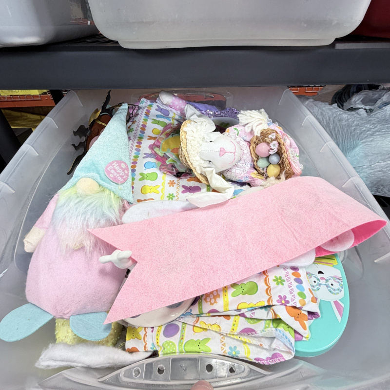 Lot 238: Bella 7 Qt Storage Container with Easter Decorations and Holiday Items