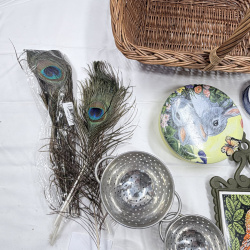 Lot 247: Wicker Basket, Peacock Feathers, Metal Colanders, Owl Decor Plates & Trivet Lot