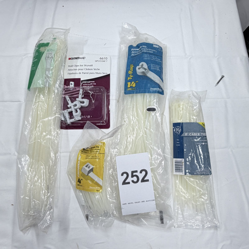 Lot 252: Assorted Cable Ties and Drywall Clips - ClosetMaid, Ti-Rap, GE Brands