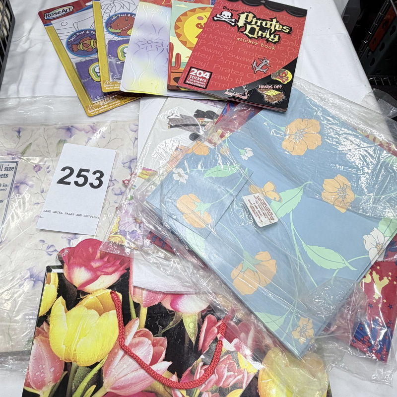 Lot 253: Mixed Lot Scrapbook Craft Supplies Gift Wrap Paper Stickers Books Basket