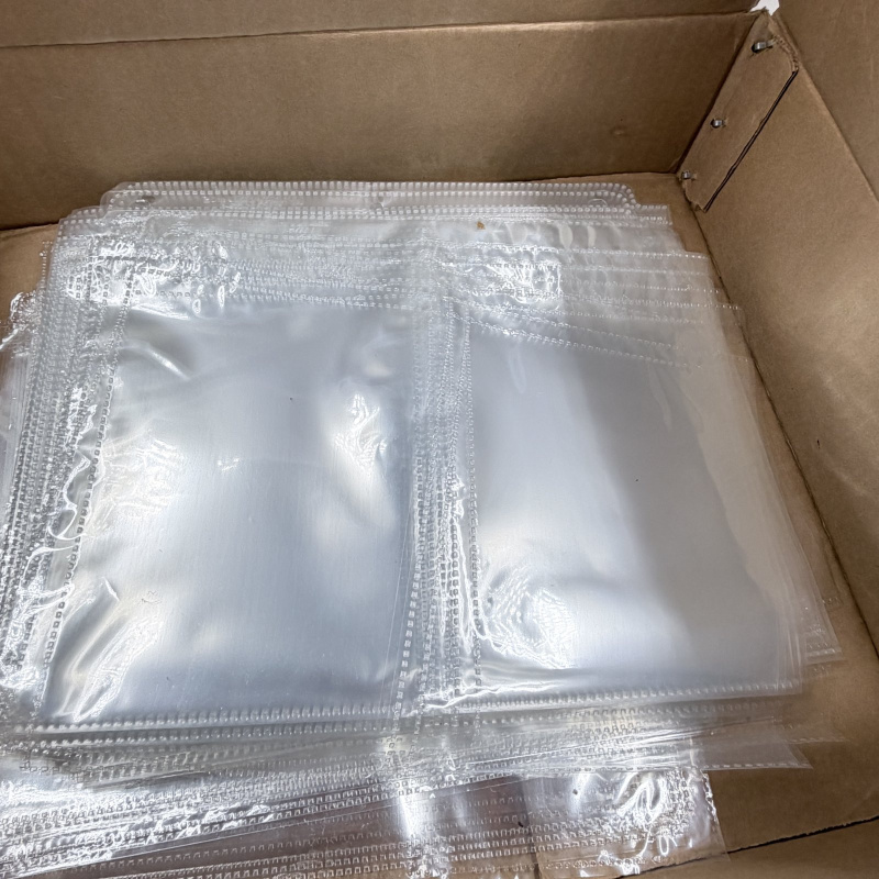 Lot 255: Box of Clear Plastic Binder Sheets, 1/4 Page and 1/2 Page