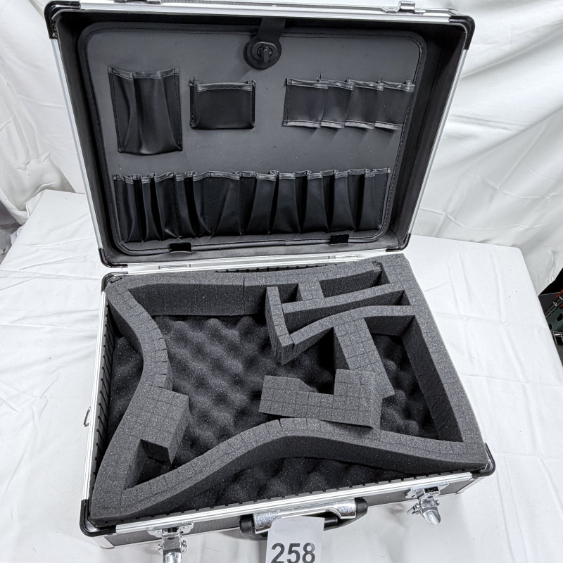 Lot 258: Black Aluminum Hard Case with Custom Foam Insert and Tool Organizer Pockets
