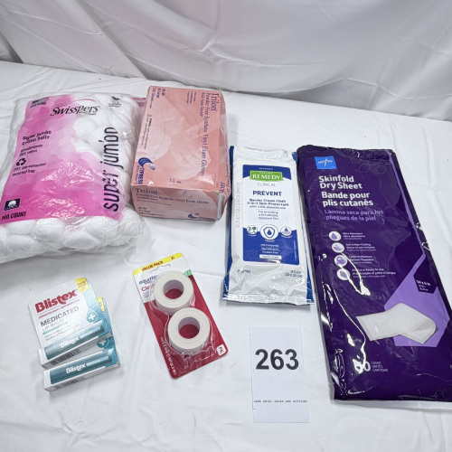 Lot 263: Medical Supplies Lot: Swisspers Cotton Balls, Trillor Gloves, Skinfold Dry Sheets, Tape, Blistex
