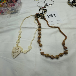 Lot 281: Clear Plastic Jewelry Organizer with Assorted Costume Jewelry Beads Necklaces
