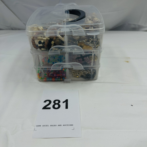 Lot 281: Clear Plastic Jewelry Organizer with Assorted Costume Jewelry Beads Necklaces