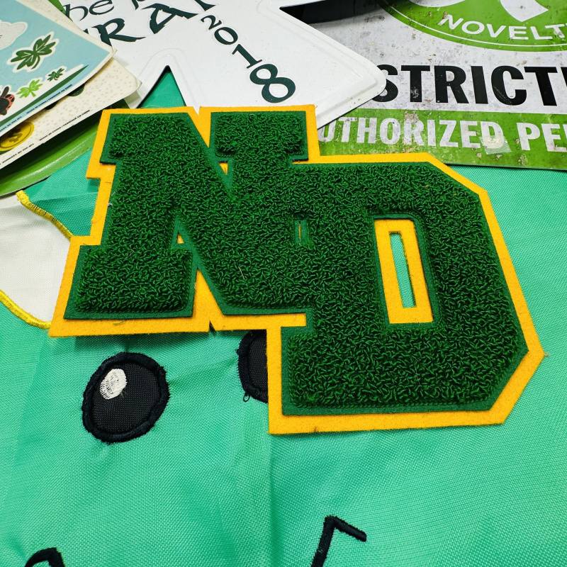 Lot 282: St. Patrick's Day Decorations Bundle - Banner, Window Clings, ND Patch, Shamrock Items