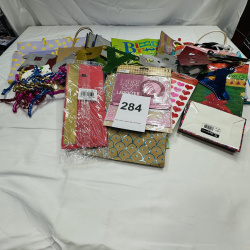 Lot 284: Scrapbook Supplies Lot - Gift Bags, Tissue Paper, Ribbons, "Love and Laughter" Kit