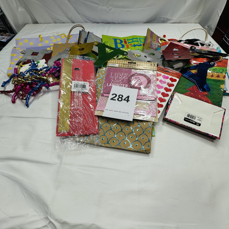 Lot 284: Scrapbook Supplies Lot - Gift Bags, Tissue Paper, Ribbons, "Love and Laughter" Kit