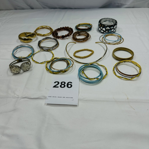 Lot 286: Assorted Bracelet Lot - Gold tone, Silver tone, Beaded & Bangle Styles