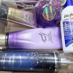 Lot 307: Women's Body Care Lot - Victoria's Secret, Licefreee Shampoo, Hair Brushes, Perfume
