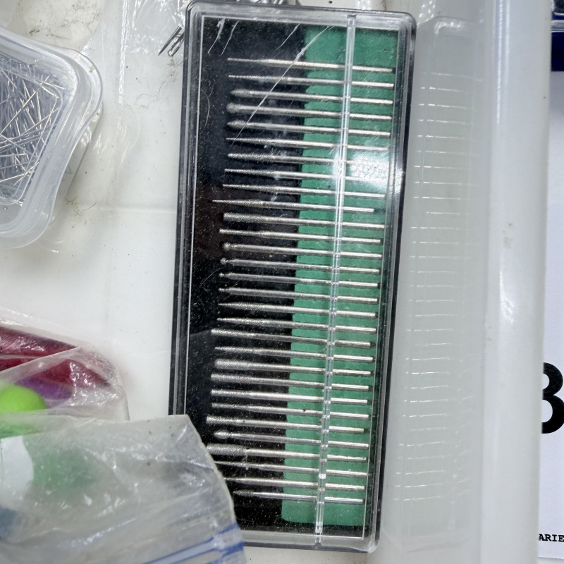 Lot 337: Crafting Supplies Lot - Dremel Sanding Kit, Needles, Twine, Measuring Tape, Wire
