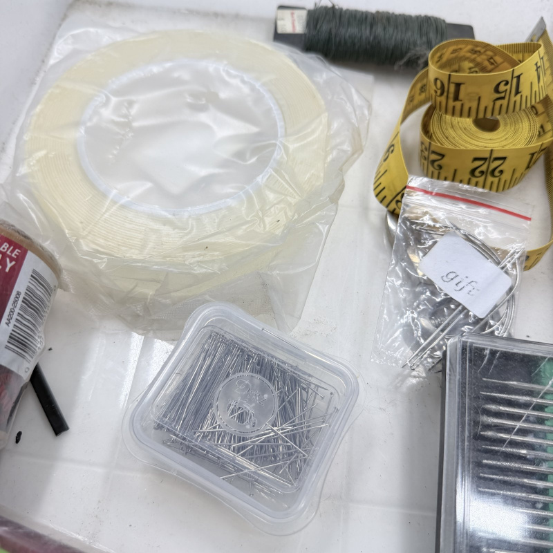 Lot 337: Crafting Supplies Lot - Dremel Sanding Kit, Needles, Twine, Measuring Tape, Wire