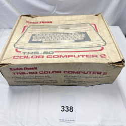 Lot 338: Radio Shack TRS-80 Color Computer 2 with Original Box, Games & Cassettes