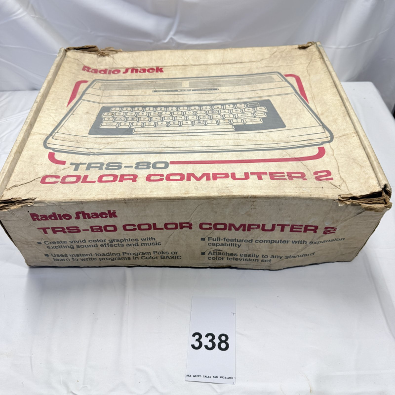 Lot 338: Radio Shack TRS-80 Color Computer 2 with Original Box, Games & Cassettes