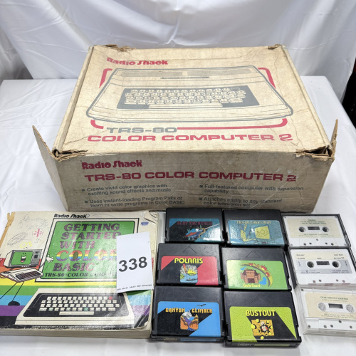 Lot 338: Radio Shack TRS-80 Color Computer 2 with Original Box, Games & Cassettes