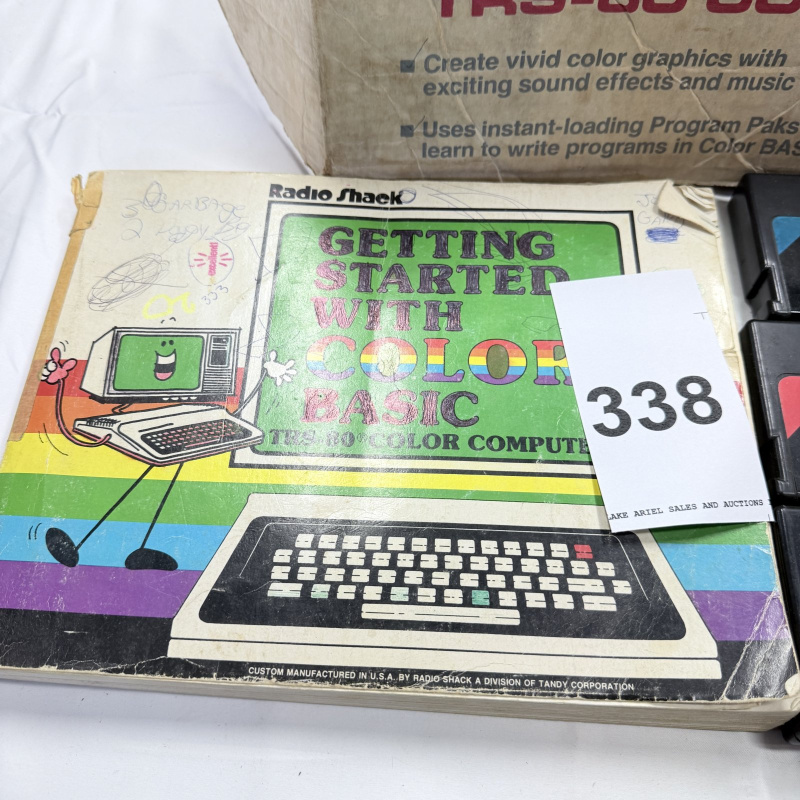 Lot 338: Radio Shack TRS-80 Color Computer 2 with Original Box, Games & Cassettes