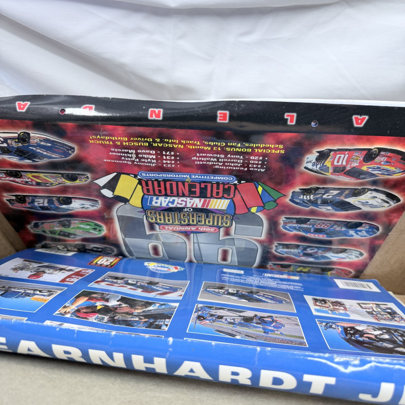 Lot 341: NASCAR Collectibles Lot - Die-Cast Cars, Plush Dolls, Photos, Interstate Batteries #18