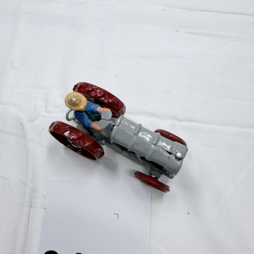 Lot 345: Die Cast Toy Tractor with Farmer Figure Gray & Red Metal