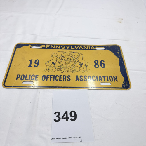 Lot 349: 1986 Pennsylvania Police Officers Association License Plate Gold Blue