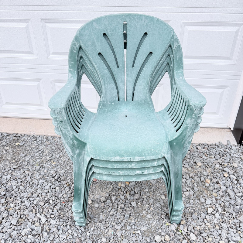 Lot 648: Vintage stackable resin patio armchairs, set of 3, sage green