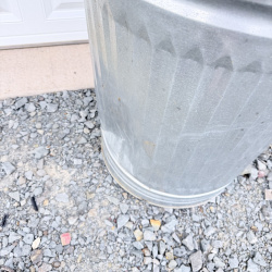 Lot 649: Vintage galvanized steel 20-gallon garbage can with lid, ribbed body and swing handles