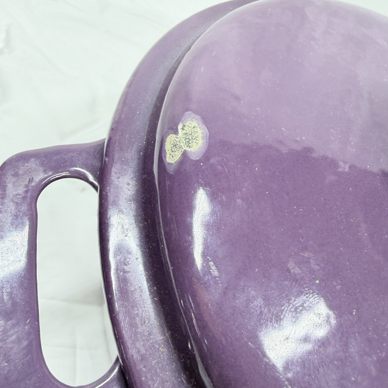 Lot 367: Bella purple enamel cast iron Dutch oven with lid, round covered casserole pot