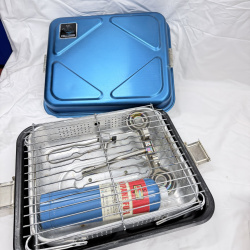 Lot 371: Vintage Kangaroo Kitchen KK-3080 portable propane camp stove/grill set with griddle, case, and utensils
