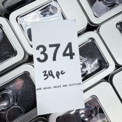 Lot 374: Fidget hand spinners in metal storage tins, lot of 34 pieces