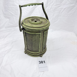 Lot 381: Vintage faux bamboo & wicker-pattern plastic ice bucket with swing handle, lidded insulated liner