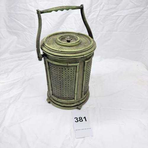 Lot 381: Vintage faux bamboo & wicker-pattern plastic ice bucket with swing handle, lidded insulated liner