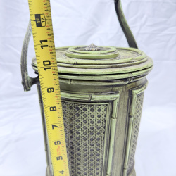 Lot 381: Vintage faux bamboo & wicker-pattern plastic ice bucket with swing handle, lidded insulated liner