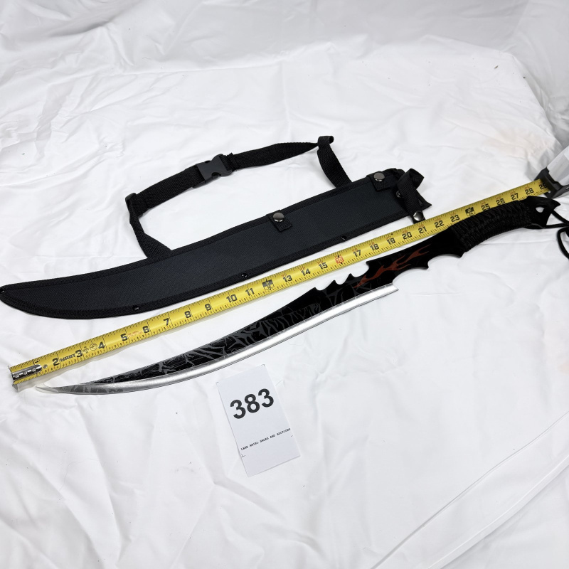 Lot 383: Double-blade scimitar sword with flame/tribal design, paracord-wrapped handle, nylon sheath and shoulder strap