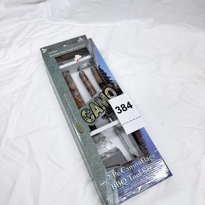 Lot 384: CB Outdoor Camo 2 Pc Camouflage BBQ Tool Set, Fall Transition camo, stainless steel tongs and turner